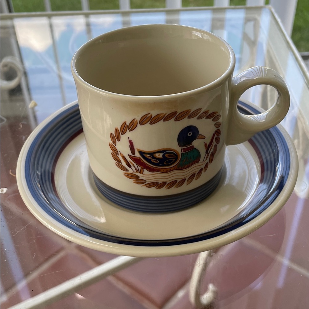 Elegant Cream and Blue Duck Motif Mug and Saucer